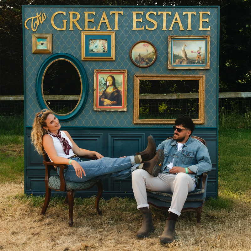 A couple at a festival wearing LANX boots