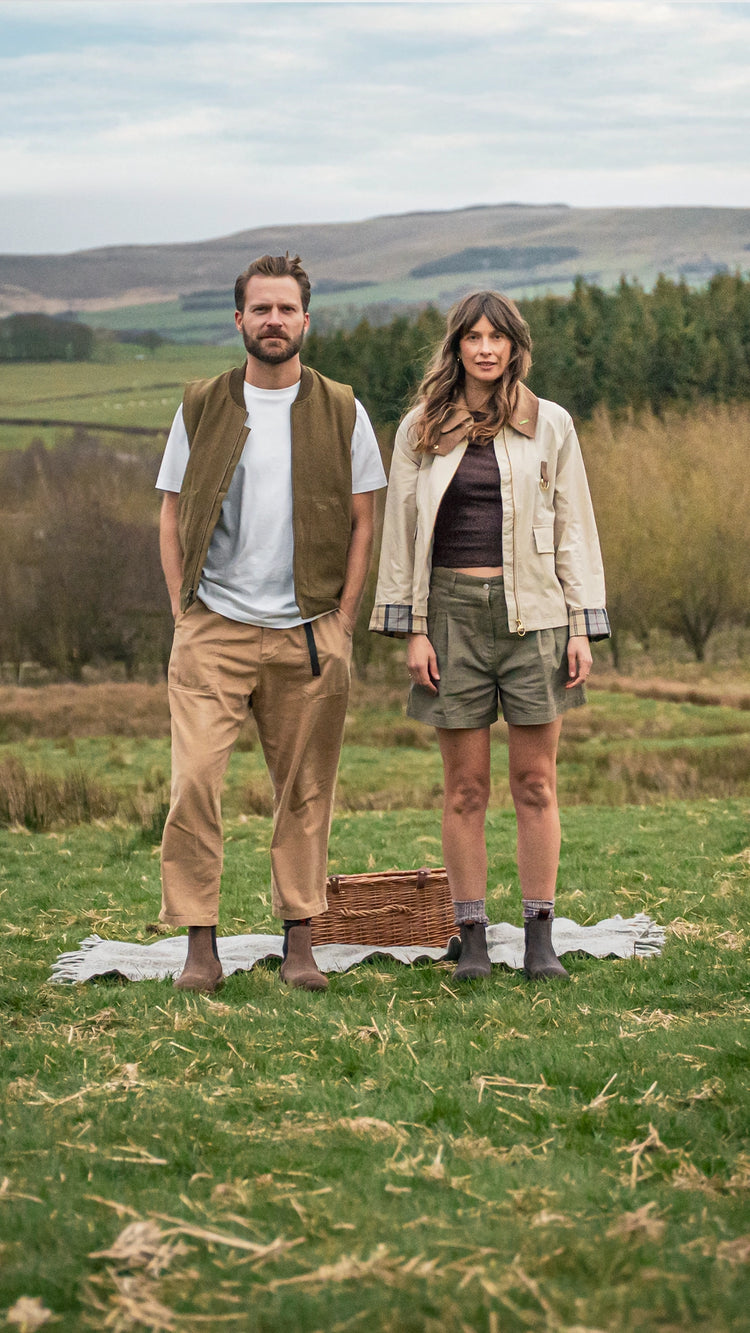 two people a man and a woman wearing country casual clothing and LANX shoes